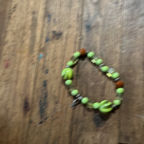 These two green bracelets are a bundle u can get. - Picture 2 of 4